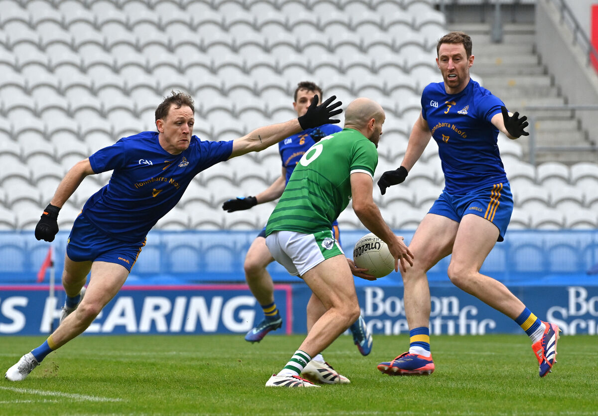 St Finbarr's players Sam Ryan and Jamie Burns looking to block down Frank Down, Ballincollig, in their McCarthy Insurance Group Senior FC semi-final at Páirc Uí Chaoimh. Picture: Dan LinehanSt St Finbarr's players Sam Ryan and Jamie Burns looking to block down Frank Down, Ballincollig, in their McCarthy Insurance Group Senior FC semi-final at Páirc Uí Chaoimh. Picture: Dan LinehanSt