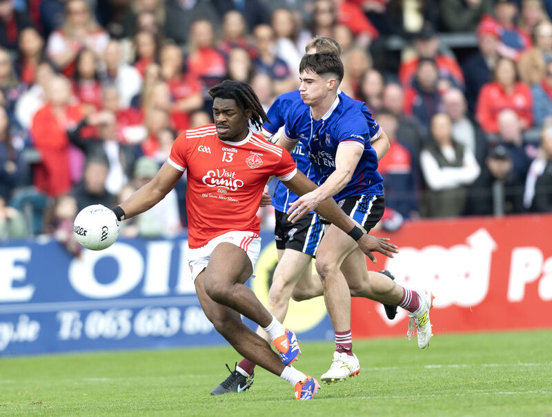 Éire Óg's Ikem Ugweru and St Joseph's Eoghan Boyle in action. Picture: Eamon Ward Éire Óg's Ikem Ugweru and St Joseph's Eoghan Boyle in action. Picture: Eamon Ward