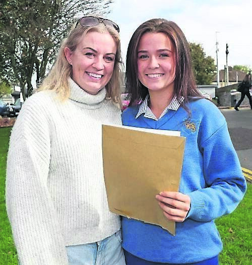 Susan Meaney with her daughter, Chloe Meaney, after receiving her Junior Certificate results, at Christ King Girls Secondary School, Half Moon Lane, South Douglas Road.