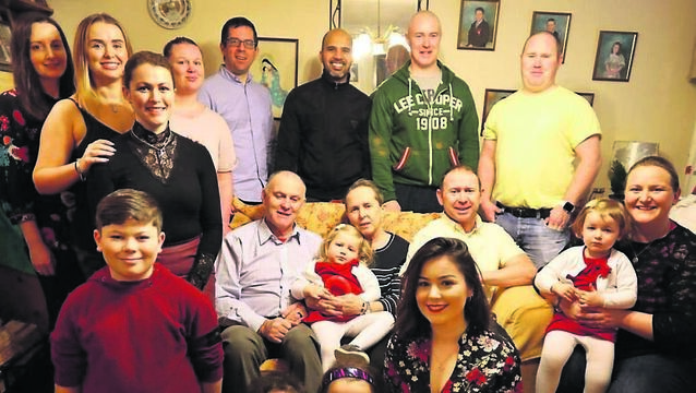 <p class="contextmenu internal_Caption">Julie Cummins, originally of Dublin Hill, with her family on a visit home to Cork. </p>