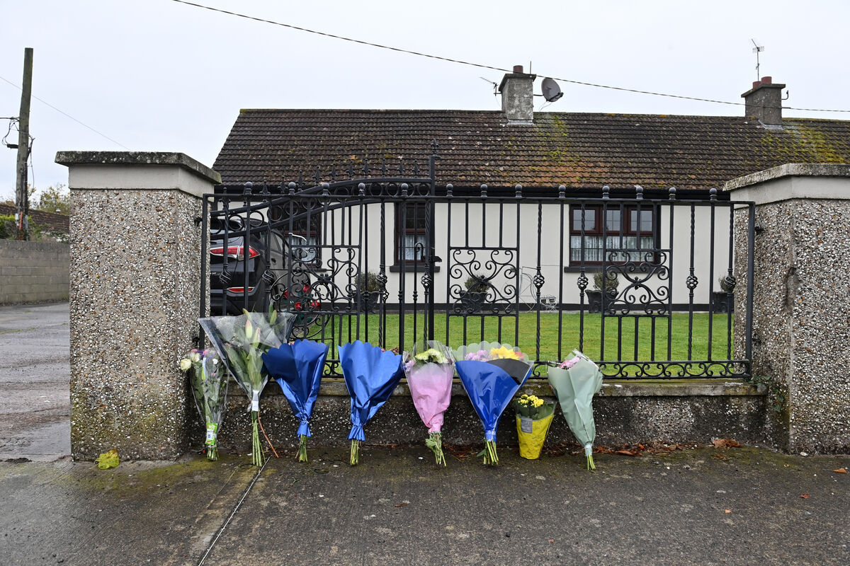 Flowers at the residence on Rockview Terrace, Doneraile, Co Cork, where the body of postman Barry Daly was discovered on Sunday morning. Picture Dan Linehan Flowers at the residence on Rockview Terrace, Doneraile, Co Cork, where the body of postman Barry Daly was discovered on Sunday morning. Picture Dan Linehan