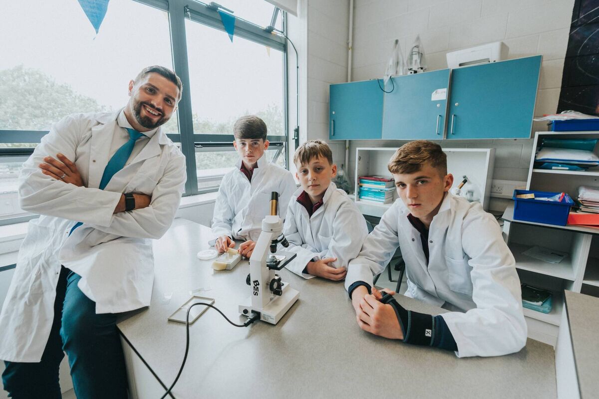 Tadhg O'Donovan, with pupils Kalen O’Sullivan, Colin McCarthy, and Lee Pardy at Carrigaline Community School. 