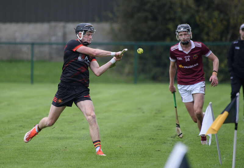  James Murray of CBC getting his shot away watched by Jack Marnell of Our Lady's Templemore. Picture: Dan Linehan