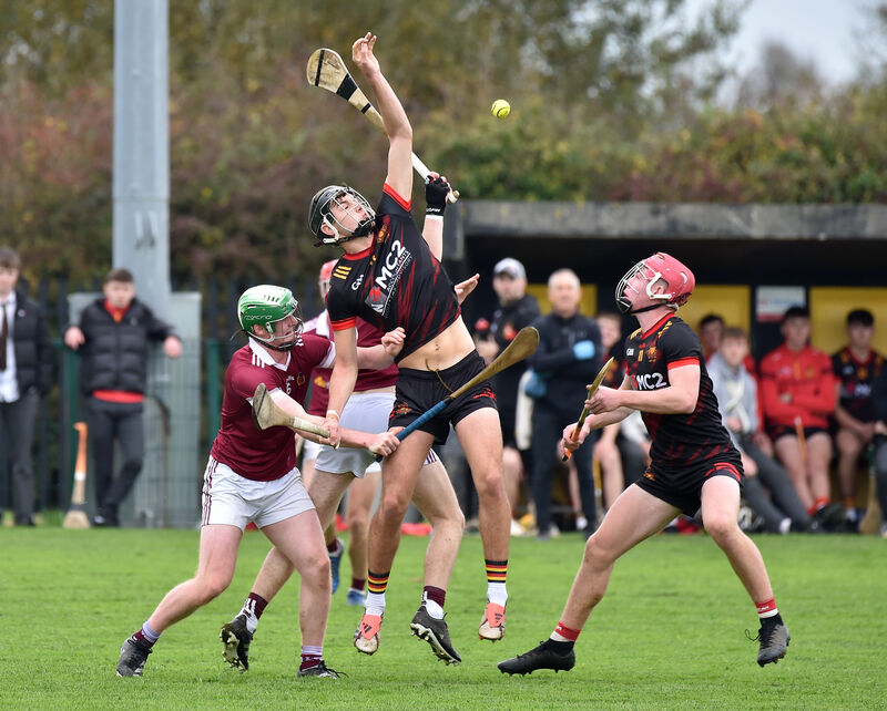  CBC'S Michael Tadhg Brosnan goes high with Shay Gleeson of  Our Lady's Templemore. Picture: Dan Linehan