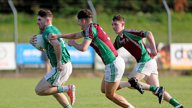 <p> Adam Murphy and Brendan O'Sullivan Aghabullogue, chased Blake Murphy, St Vincent's, in their group game at Ballincollig. Picture: Jim Coughlan.</p>