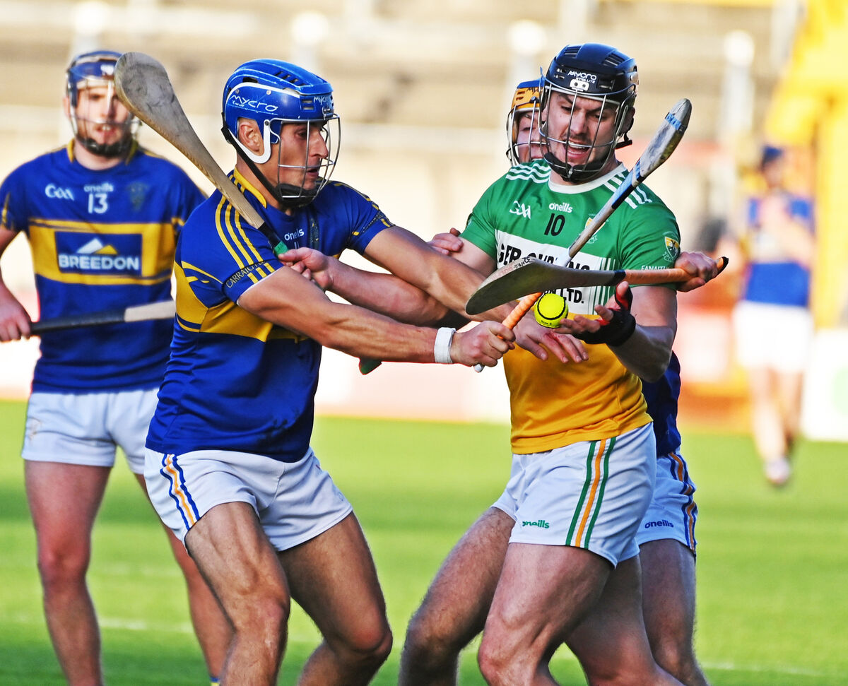 Bride Rovers' Conleith Ryan is tackled by Carrigtwohill's Sean Walsh. Picture: Eddie O'Hare
