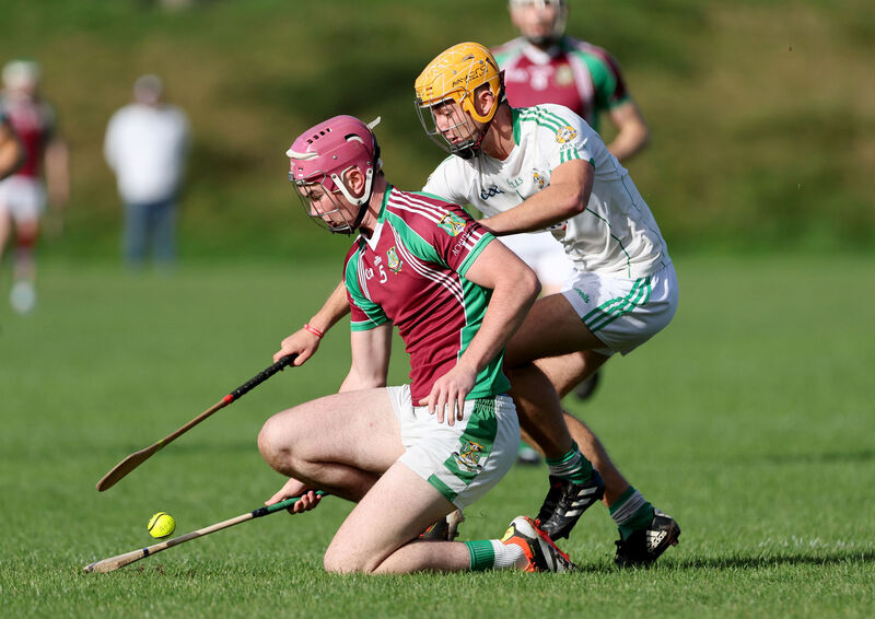 Colm Gillespie of Aghabullogue holds off Noah Devoy of Aghada. Picture: Jim Coughlan Colm Gillespie of Aghabullogue holds off Noah Devoy of Aghada. Picture: Jim Coughlan