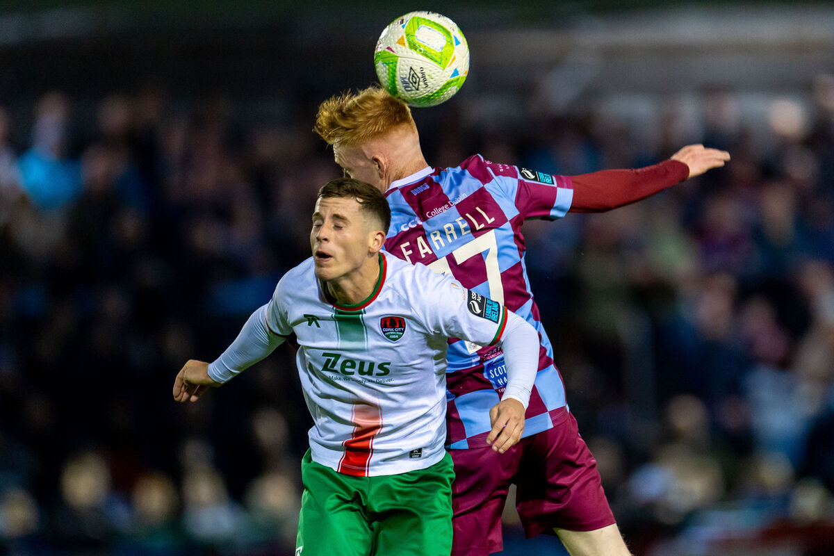 Drogheda United’s Shane Farrell rises high from Evan McLaughlin of Cork City. Picture: INPHO/Morgan Treacy