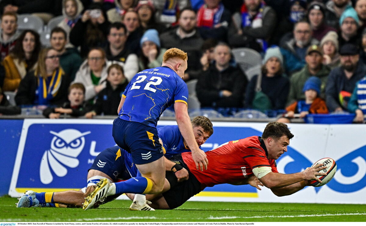 Tom Farrell of Munster is tackled by Scott Penny and Ciarán Frawley of Leinster, which resulted in a penalty try during the United Rugby Championship match at Croke Park. Picture: Sam Barnes/Sportsfile Tom Farrell of Munster is tackled by Scott Penny and Ciarán Frawley of Leinster, which resulted in a penalty try during the United Rugby Championship match at Croke Park. Picture: Sam Barnes/Sportsfile
