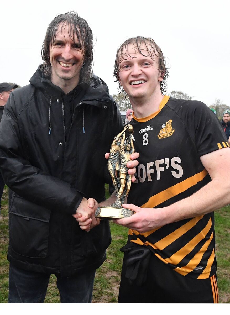 Donal Gayer presents the Ashgrove Renewables Duhallow JAFC Man of the Match award to Castlemagner's Conor O'Sullivan. Picture: John Tarrant 