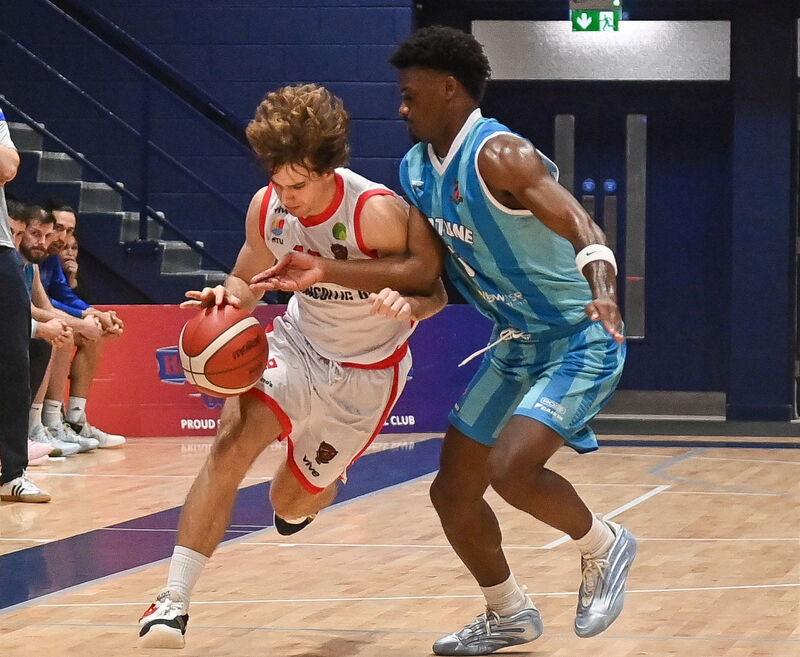 Ballincollig's Alberto Rodriguez tries to get past Neptune's Zyon Dobbs. Picture: David Keane. Ballincollig's Alberto Rodriguez tries to get past Neptune's Zyon Dobbs. Picture: David Keane.