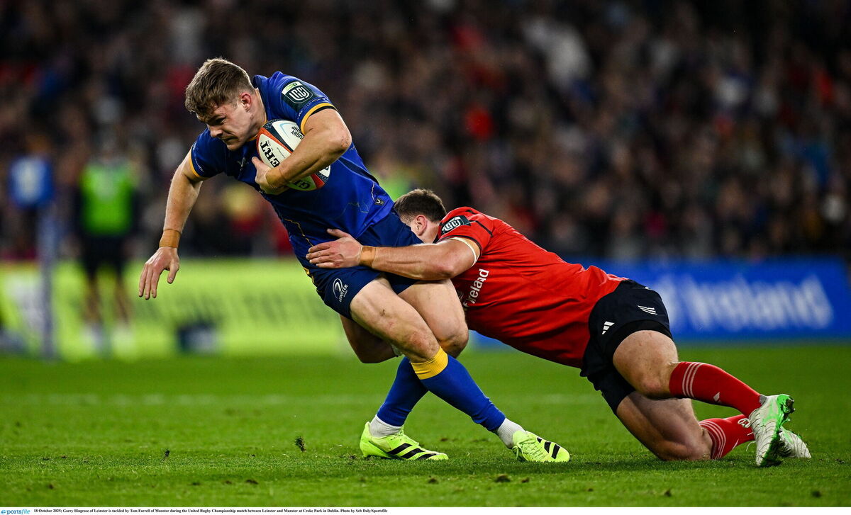 Garry Ringrose of Leinster is tackled by Tom Farrell of Munster. Picture: Seb Daly/Sportsfile