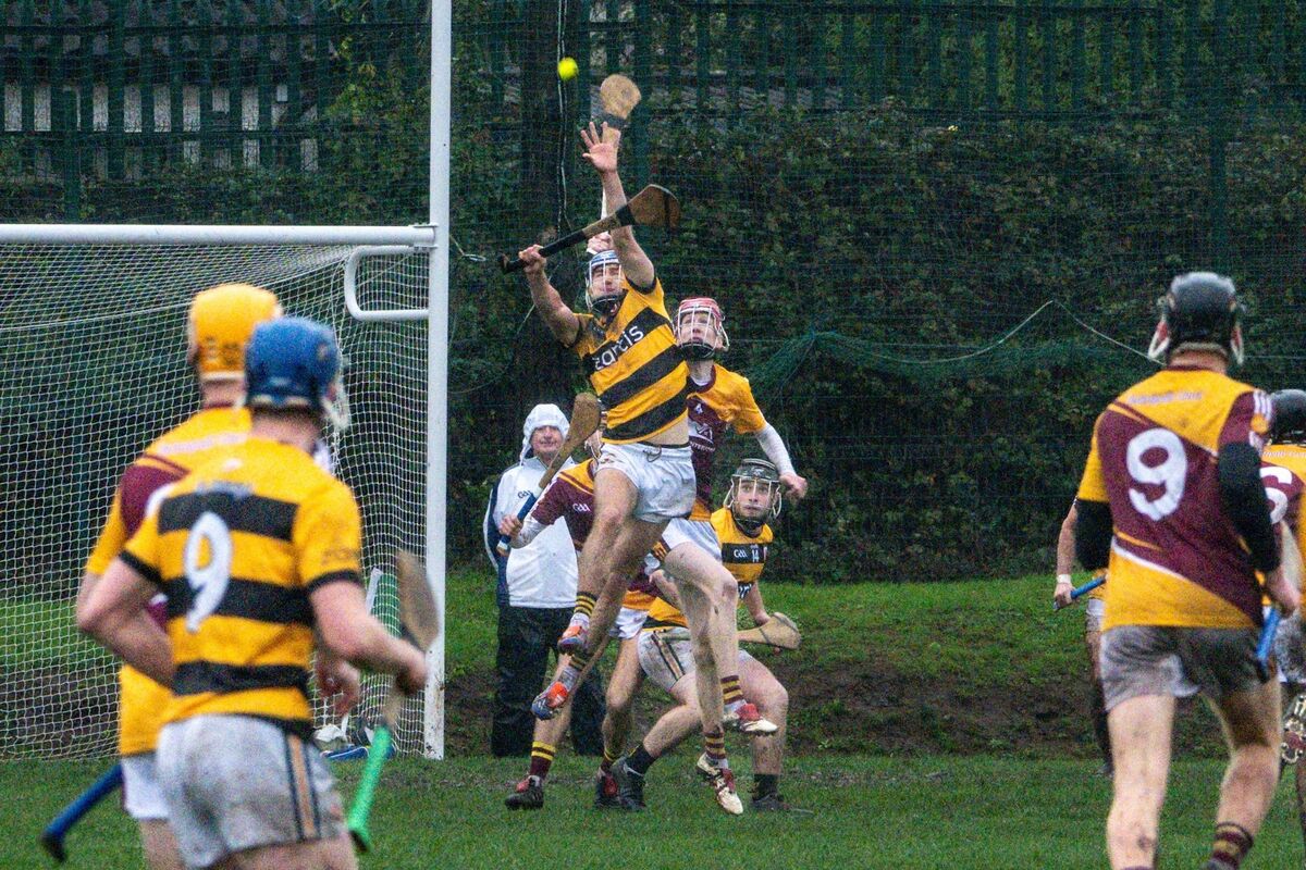 Na Piarsaigh’s Jack Scanlon leaps high to gain possession against Whitechurch. Picture: Chani Anderson. Na Piarsaigh’s Jack Scanlon leaps high to gain possession against Whitechurch. Picture: Chani Anderson.
