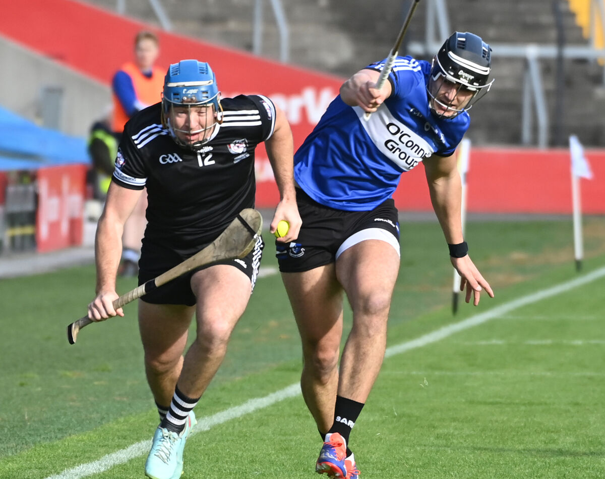 Midleton's Killian McDermott breaks from Sarsfields' Luke Elliott. Picture: Eddie O'Hare Midleton's Killian McDermott breaks from Sarsfields' Luke Elliott. Picture: Eddie O'Hare