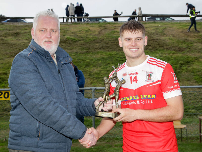 Tim O'Sullivan of Clash Awards presents the man of the match trophy to Brian O'Donovan of Ballinascarthy. Picture: David Creedon Tim O'Sullivan of Clash Awards presents the man of the match trophy to Brian O'Donovan of Ballinascarthy. Picture: David Creedon