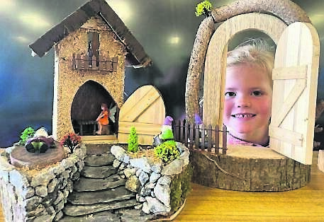 Beth Granleese (6) explores fairy doors on display at Mayfield Library over October. Beth Granleese (6) explores fairy doors on display at Mayfield Library over October.
