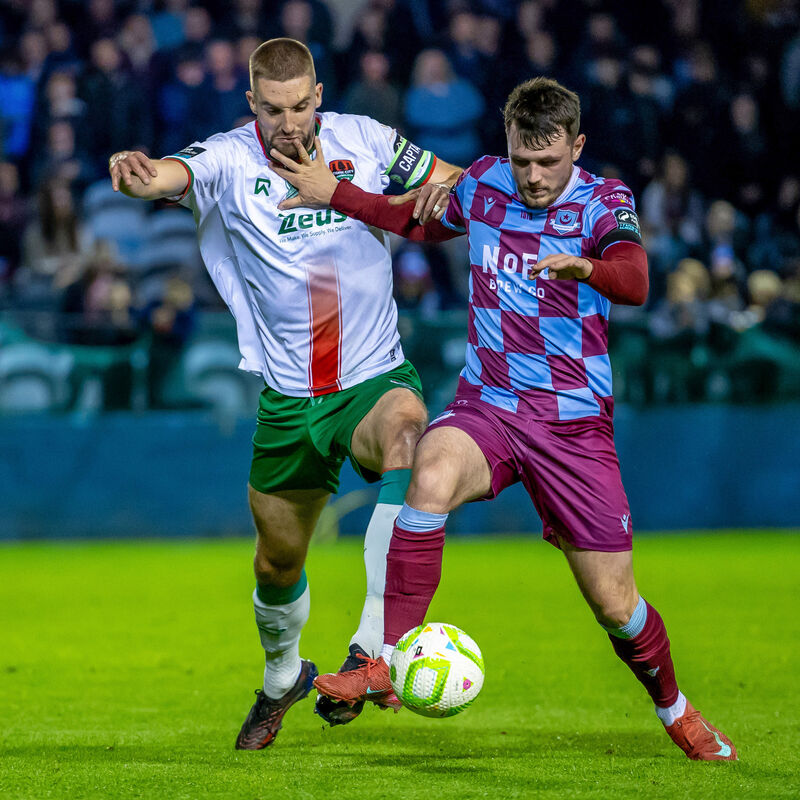 Drogheda United’s Jack Stretton with Fiacre Kelleher of Cork City Drogheda United’s Jack Stretton with Fiacre Kelleher of Cork City