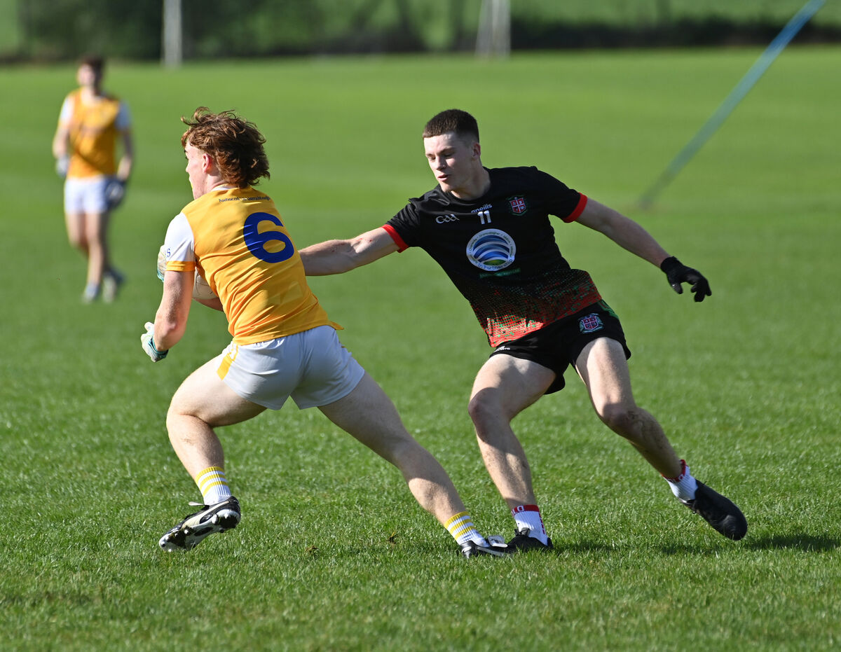  Loughlin O'Donnell of Hamilton High School Bandon breaking the tackle of Ben O'Shea of Patrician Academy Mallow. Picture: Dan Linehan