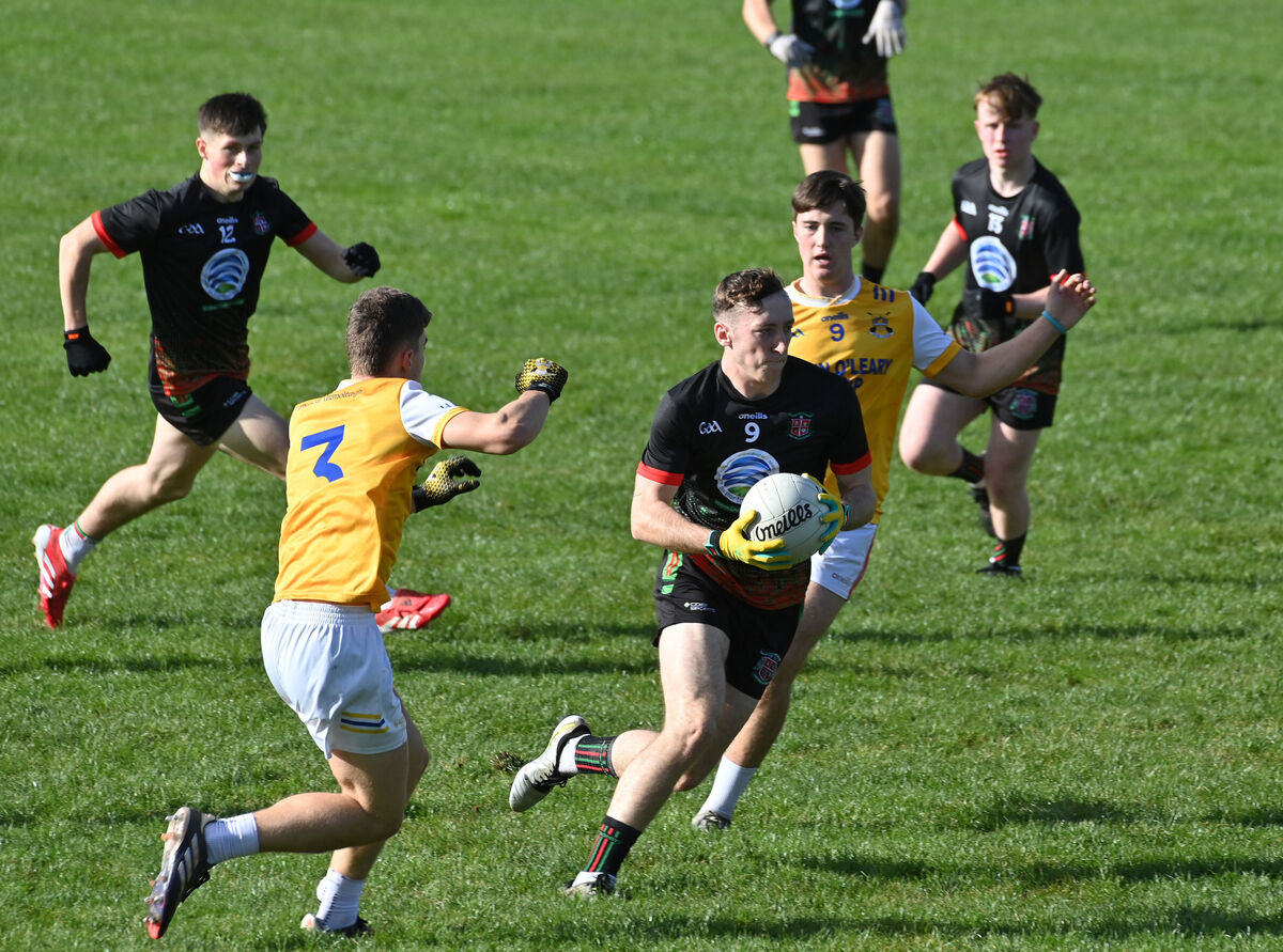  Hamilton High School Bandon players Ben Coffey and Eddie O'Sullivan looking to stop Cian Cooney of Patrician Academy Mallow. Picture: Dan Linehan