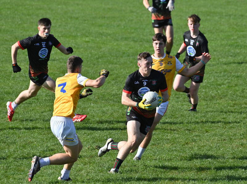 Hamilton High School Bandon players Ben Coffey and Eddie O'Sullivan looking to stop Cian Cooney of Patrician Academy Mallow. Picture: Dan Linehan Hamilton High School Bandon players Ben Coffey and Eddie O'Sullivan looking to stop Cian Cooney of Patrician Academy Mallow. Picture: Dan Linehan