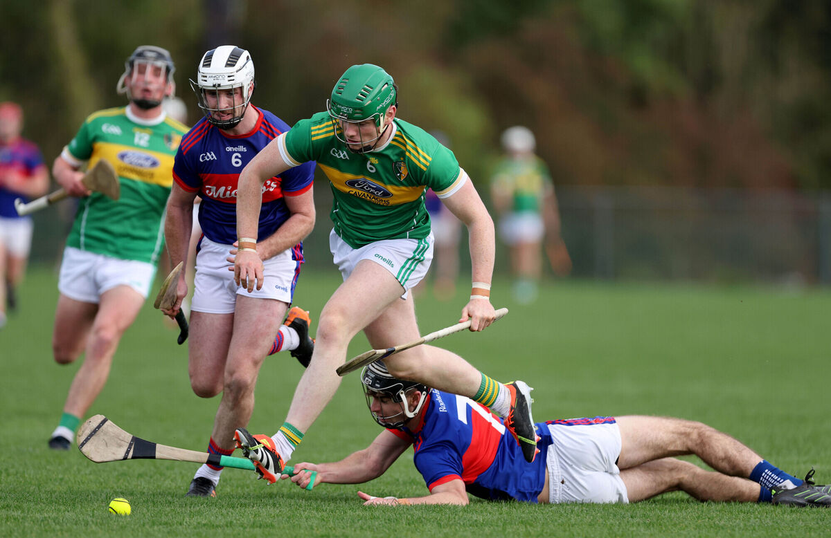 Shane Broderick and Cormac McDonnell, Erin's Own, battle with Cormac O'Brien, Newtownshandrum during their 2025 Premier Senior Hurling Championship relegation play-off at Mourneabbey. Picture: Jim Coughlan. Shane Broderick and Cormac McDonnell, Erin's Own, battle with Cormac O'Brien, Newtownshandrum during their 2025 Premier Senior Hurling Championship relegation play-off at Mourneabbey. Picture: Jim Coughlan.