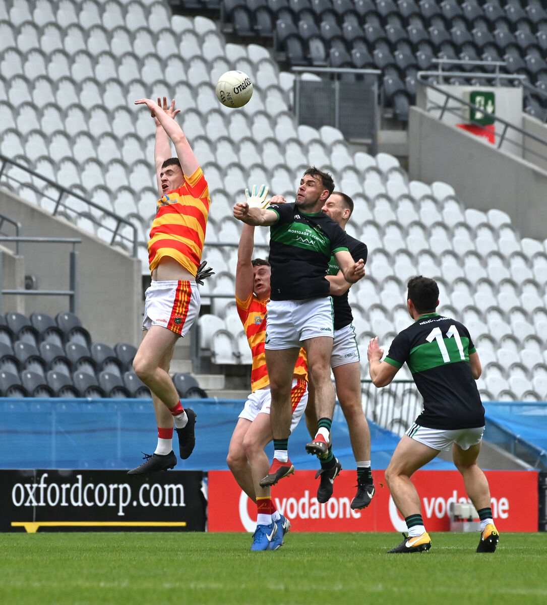 Nemo Rangers players Kieran Histon and Alan O'Donovan jumping for this high ball with David Buckley, Newcestown in their McCarthy Insurance Group Senior FC semi-final match at Páirc Uí Chaoimh. Picture Dan Linehan Nemo Rangers players Kieran Histon and Alan O'Donovan jumping for this high ball with David Buckley, Newcestown in their McCarthy Insurance Group Senior FC semi-final match at Páirc Uí Chaoimh. Picture Dan Linehan