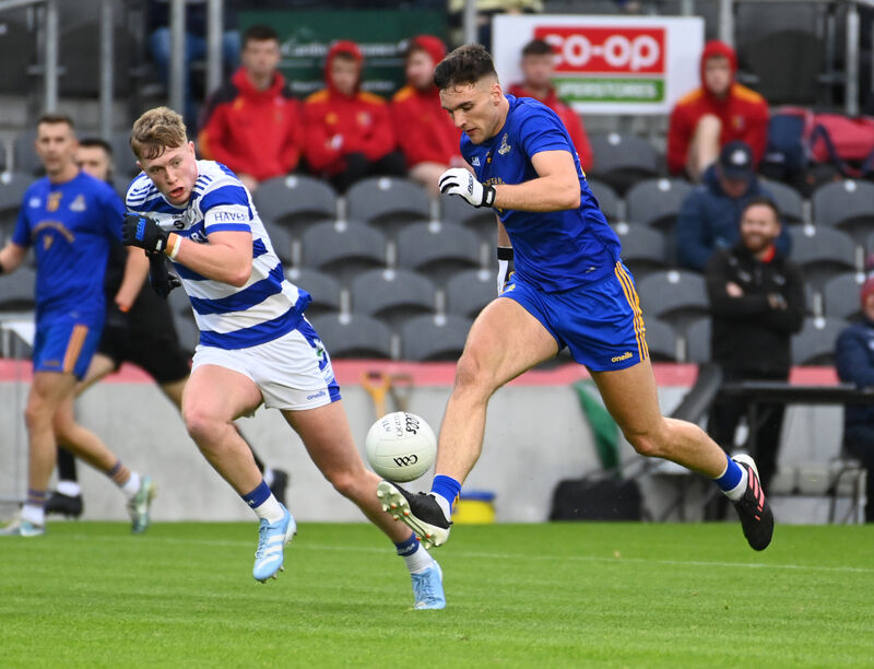 St Finbarr's Brian Hayes goes past Castlehaven's Jack O'Neill. Picture: Eddie O'Hare St Finbarr's Brian Hayes goes past Castlehaven's Jack O'Neill. Picture: Eddie O'Hare
