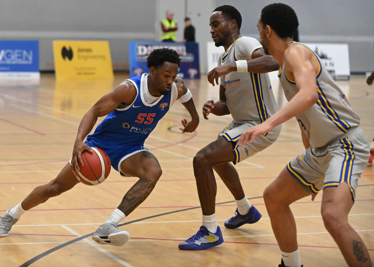 UCC Demons' Shariff Black takes on Flexachem Killorglin's Echezona Okeke. Picture: Eddie O'Hare