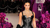 Kim Kardashian says she suffered a brain aneurysm