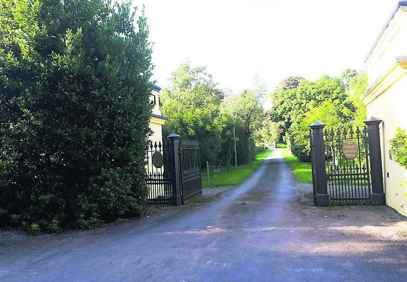 The entrance to Ballynatray House with the lodges either side of the gate. Mike Hackett used to cycle down here at night in the pitch black to deliver telegrams as a boy