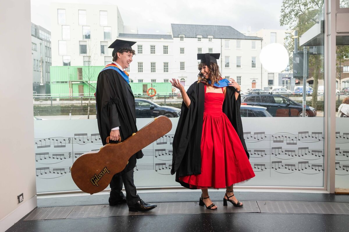  Cillian O’Brien (Ballycotton, Co. Cork) and Sophie Kirkby (Belgooly, Co. Cork), who graduated with a Bachelor of Arts (Honours) in Popular Music, pictured walking into their graduation at the Munster Technological University (MTU) Autumn 2025 Conferring Ceremony, held at the MTU Cork School of Music on 23 October 2025. Photo: Joleen Cronin.