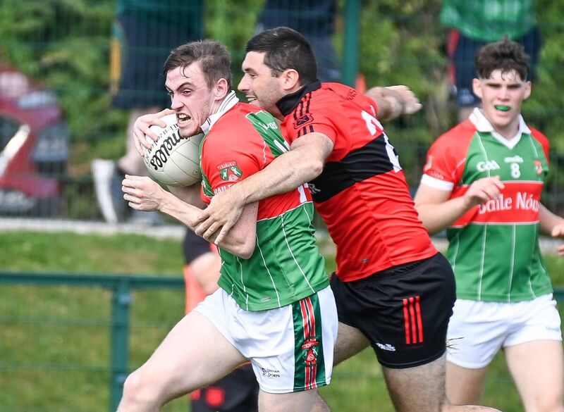 Ballinora's Daragh Holmes is tackled by Mitchelstown's Fionn Herlihy in 2023. Picture: David Keane Ballinora's Daragh Holmes is tackled by Mitchelstown's Fionn Herlihy in 2023. Picture: David Keane