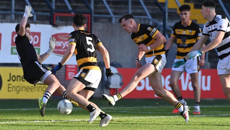 Buttevant's Michael O'Neill slots the ball past St Nick's goalkeeper Ross Cronin. Picture: Eddie O'Hare