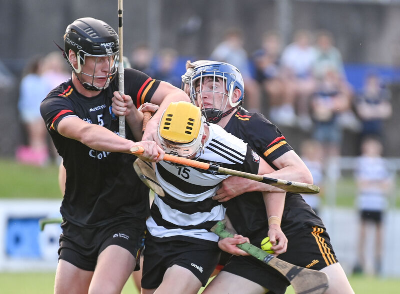 Midleton's Peter Barrett is strongly challenged by St Colman's Darragh Cahill and Enda Millerick, during their Premier 1 MHC clash at Midleton this season. Picture: David Keane. Midleton's Peter Barrett is strongly challenged by St Colman's Darragh Cahill and Enda Millerick, during their Premier 1 MHC clash at Midleton this season. Picture: David Keane.