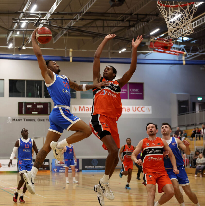 Shariff Black, UCC Demons, takes on Robert Braswell, Killester. Picture: Jim Coughlan.  Shariff Black, UCC Demons, takes on Robert Braswell, Killester. Picture: Jim Coughlan.