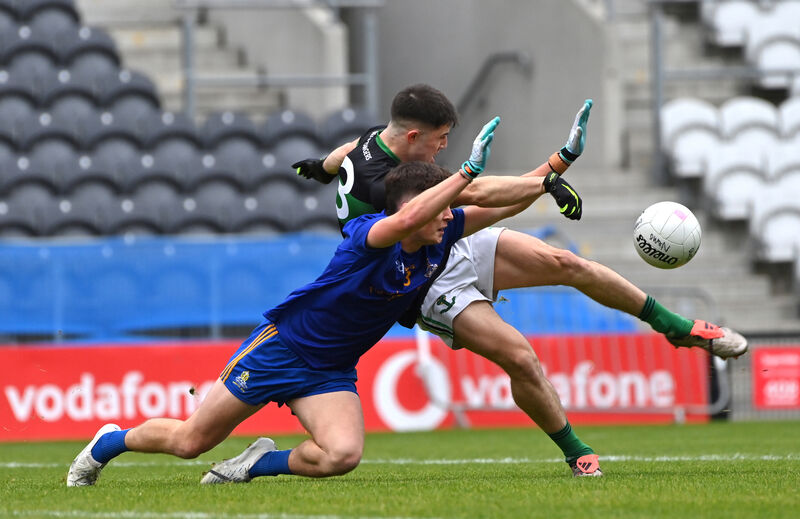 Brian Hayes, Nemo Rangers, gets his shot in despite the attention of John Winnington Barrett, St Finbarr's. Picture Dan Linehan  Brian Hayes, Nemo Rangers, gets his shot in despite the attention of John Winnington Barrett, St Finbarr's. Picture Dan Linehan