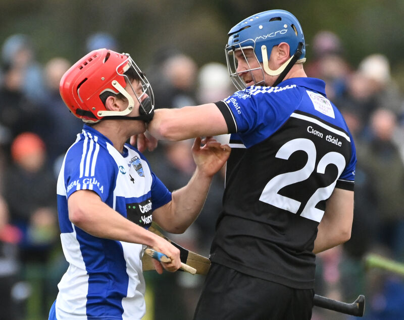 Kinsale's Brian Coughlan and Belgooly's Neill O'Sullivan get to know one another. Picture: Eddie O'Hare Kinsale's Brian Coughlan and Belgooly's Neill O'Sullivan get to know one another. Picture: Eddie O'Hare