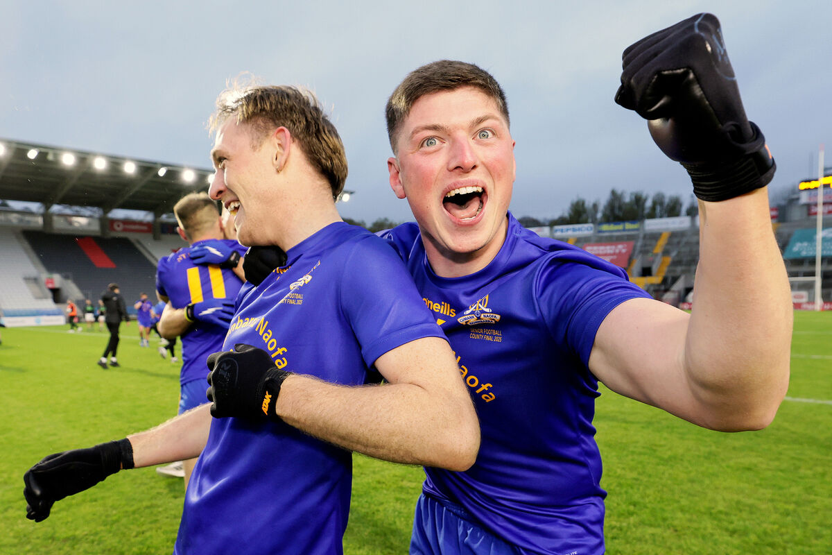 St. Finbarr's' Cillian Myers Murray celebrates after the game with Sam Ryan. Picture: ©Inpho/Laszlo Geczo