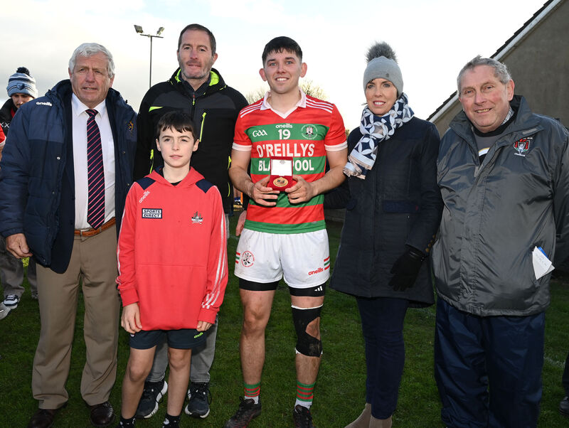 Carrig Na BhFear's Billy Connolly with the 'man of the match ' commemorative Eamon Ryan medal with Avril Geary chairperson and Jerry O'Sullivan president East Cork, with Jim, Des and Cullen Ryan after defeating Erin's Own in the Michael O'Connor Motor Factors East Cork J'A'FC final at Ballinacurra. Picture; Eddie O'Hare
