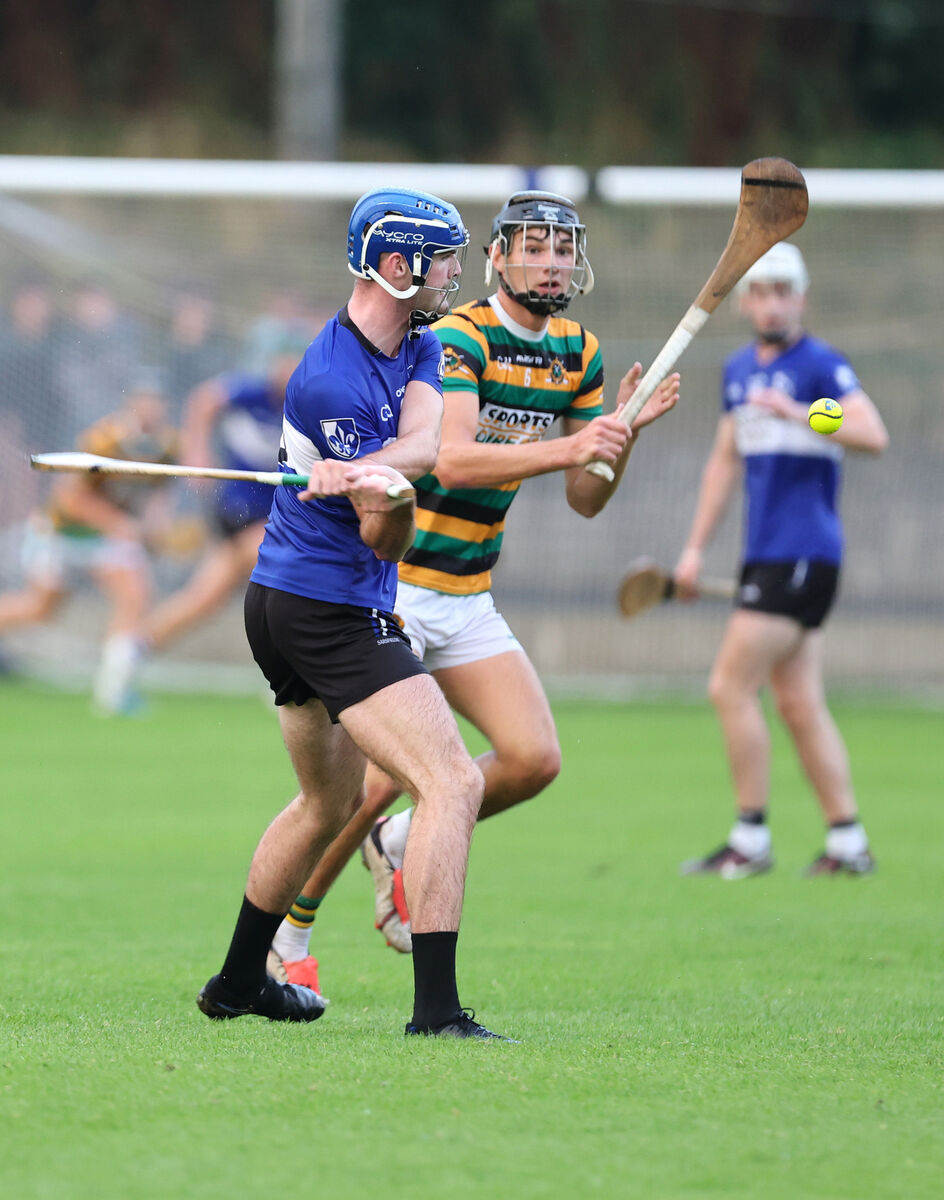 Rory Higgins, Sarsfields, clears from Michael T Brosnan, Glen Rovers. Picture: Jim Coughlan. Rory Higgins, Sarsfields, clears from Michael T Brosnan, Glen Rovers. Picture: Jim Coughlan.