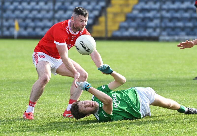 Aghada's Diarmuid Byrne gets the ball away from Iveleary's Barry Murphy. Picture: Eddie O'Hare Aghada's Diarmuid Byrne gets the ball away from Iveleary's Barry Murphy. Picture: Eddie O'Hare