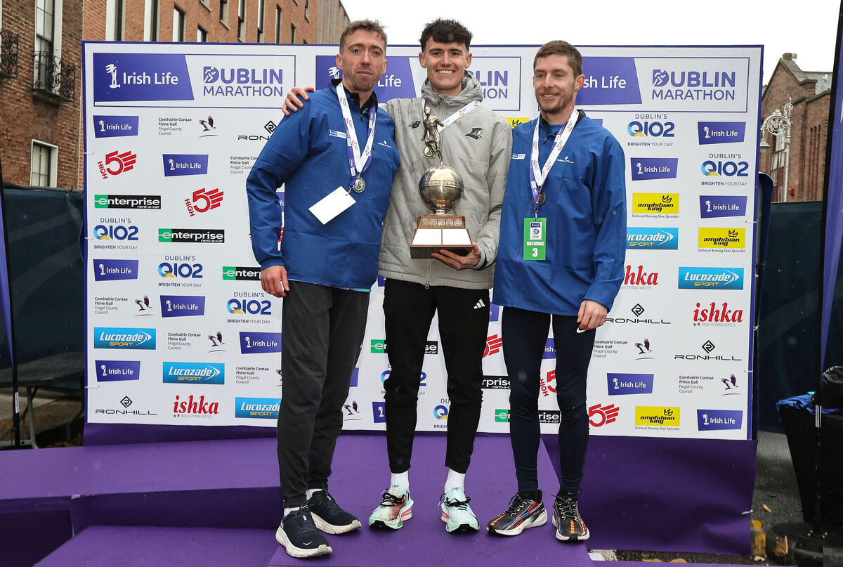 David MccGlynn of Waterford AC celebrates with the men's national title along side second place finisher Ryan Creech of Leevale AC and third place finisher Paul O'Donnell of Dundrum South Dublin AC David MccGlynn of Waterford AC celebrates with the men's national title along side second place finisher Ryan Creech of Leevale AC and third place finisher Paul O'Donnell of Dundrum South Dublin AC