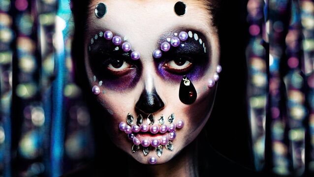 <p>Face gems can elevate your skull make-up. Make-up artist Mira Parmar says to opt for “futuristic metallics and pearlescent colours”.	<span class="contextmenu emphasis CaptionCredit">Picture: Alamy/PA</span>
            </p>