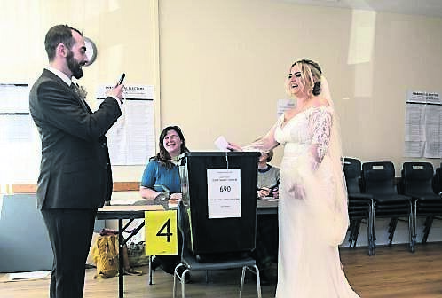 Fresh from their wedding at St Columba’s Church, Douglas, Cork, Ciara O’Sullivan, Donnybrook, and James Linehan, Togher, stopped by Douglas Community Centre, where Ciara cast her vote in the presidential election. Fresh from their wedding at St Columba’s Church, Douglas, Cork, Ciara O’Sullivan, Donnybrook, and James Linehan, Togher, stopped by Douglas Community Centre, where Ciara cast her vote in the presidential election.