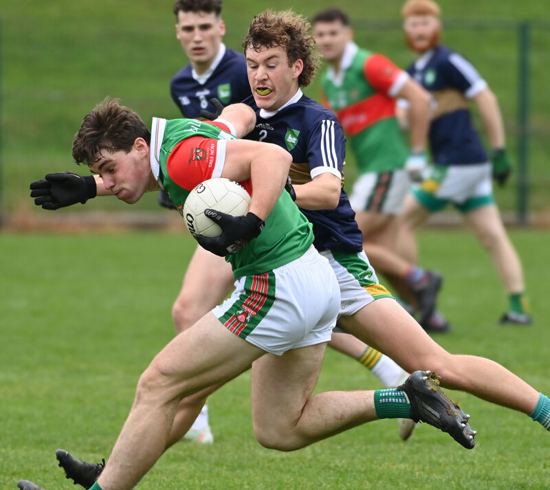 Ballinora's Shane Kingston is tackled by Kilmurry's Owen Keane during the McCarthy Insurance Group IAFC semi-final at Ovens. Picture: Eddie O'Hare Ballinora's Shane Kingston is tackled by Kilmurry's Owen Keane during the McCarthy Insurance Group IAFC semi-final at Ovens. Picture: Eddie O'Hare