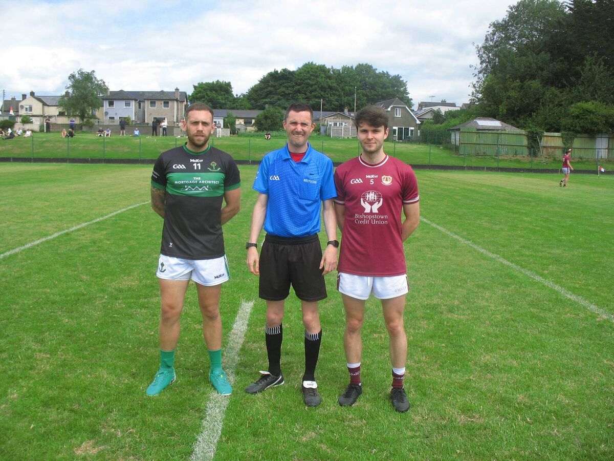 Gavin Barrett of Nemo Rangers, referee James Regan and Darragh Costello of Bishopstown before a City Junior A Football Championship game at Ballinlough this year.  Gavin Barrett of Nemo Rangers, referee James Regan and Darragh Costello of Bishopstown before a City Junior A Football Championship game at Ballinlough this year.