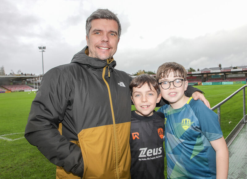 Comedian Chris Kent with his sons Jack and AJ at an open training session. 