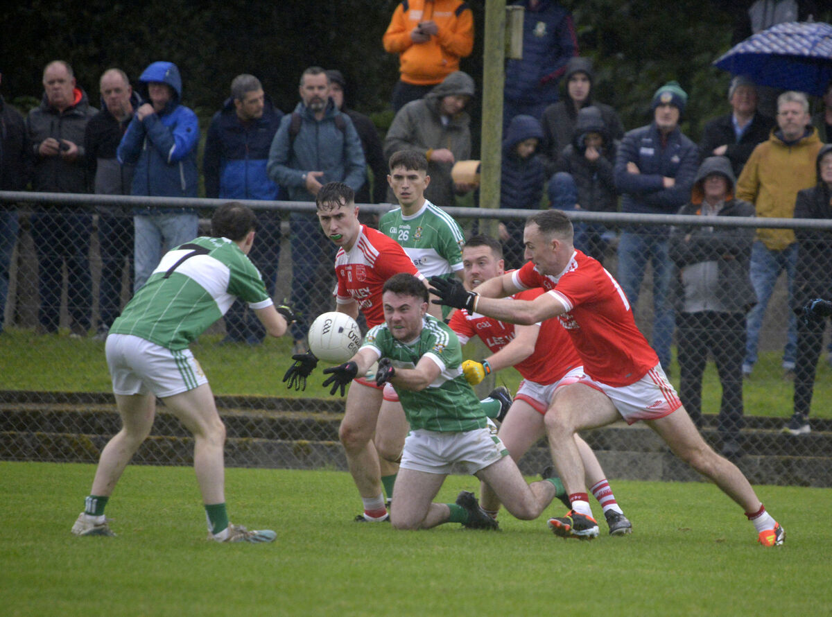  Aghabullogue and Iveleary players fight for the ball last season. Picture: Denis Boyle