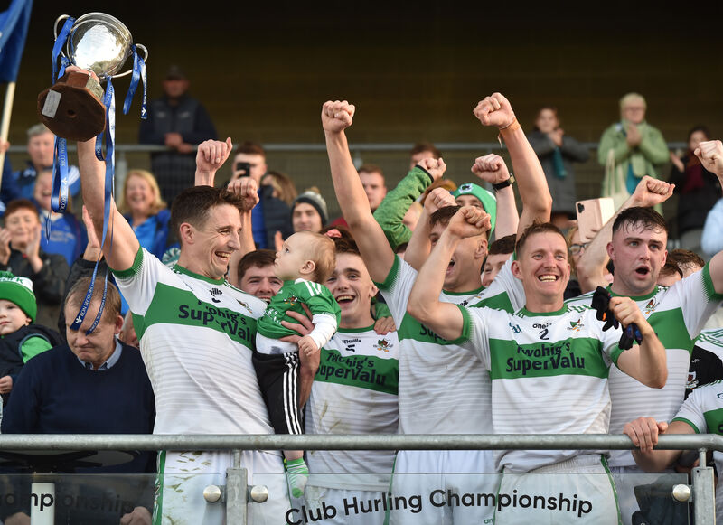 Kanturk captain Aidan Walsh with his son Macdara raises the Billy Long cup after defeating Bantry Blues in the 2022 Bon Secours Cork County   Premier IFC final - they had lost the previous two deciders. Picture: Eddie O'Hare Kanturk captain Aidan Walsh with his son Macdara raises the Billy Long cup after defeating Bantry Blues in the 2022 Bon Secours Cork County   Premier IFC final - they had lost the previous two deciders. Picture: Eddie O'Hare