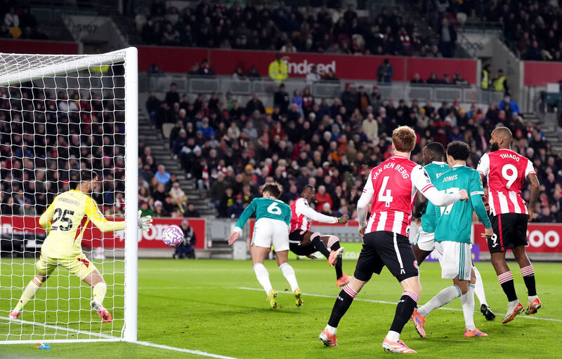 Brentford's Dango Ouattara scores their side's first goal of the game against Liverpool from a long throw-in during the Premier League match at the Gtech Community Stadium, London. Picture: Adam Davy/PA Wire Brentford's Dango Ouattara scores their side's first goal of the game against Liverpool from a long throw-in during the Premier League match at the Gtech Community Stadium, London. Picture: Adam Davy/PA Wire